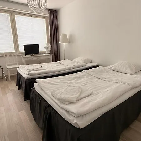 Alexanderin Huoneet Apartahotel